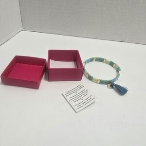 Avon Blue and Cream Beaded Bracelet with Tassel